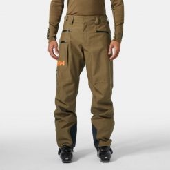 Spodnie narciarskie Helly Hansen Garibaldi 2.0. Brązowe spodnie materiałowe męskie Helly Hansen, bez wzorów, sportowe. W wyprzedaży za 1,100.50 zł.