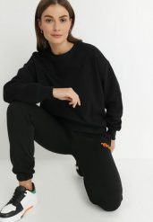 Czarna Bluza z Polarową Podszewką Colda. Czarne bluzy bez kaptura damskie Born2be, l, z dresówki. Za 59.99 zł.