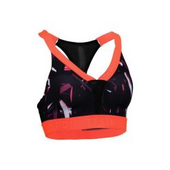 Stanik fitness cardio 520. Czerwone biustonosze sportowe damskie DOMYOS, bez wzorów, z elastanu. W wyprzedaży za 34.99 zł.