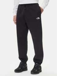 The North Face Spodnie dresowe Essential NF0A8C1F Czarny Relaxed Fit. Czarne spodnie dresowe męskie The North Face, bez wzorów, z bawełny. Za 305.99 zł.