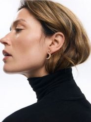 Pozłacane kolczyki z cyrkoniami - złoty. Żółte kolczyki damskie Reserved, z cyrkonią, pozłacane. Za 89.99 zł.