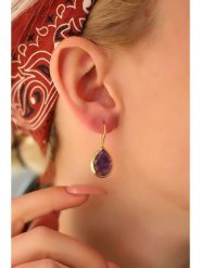 Pierres delicates Pozłacane kolczyki z ametystami rozmiar: onesize. Żółte kolczyki damskie Pierres delicates, z ametystem, pozłacane, z zapięciem typu bigiel. Za 47.82 zł.