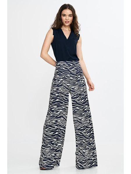 Nife Spodnie w kolorze granatowo-białym rozmiar: 40. Niebieskie spodnie materiałowe damskie Nife, bez wzorów, z materiału, z podwyższonym stanem. Za 202.50 zł.