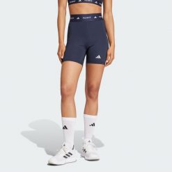 Legginsy TECHFIT Short. Czerwone legginsy damskie Adidas, bez wzorów, z materiału. W wyprzedaży za 77.40 zł.