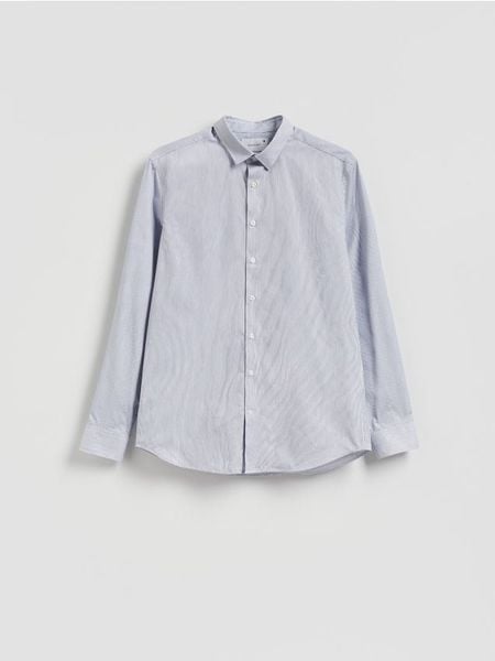 Wzorzysta koszula slim fit - niebieski. Niebieskie koszule męskie Reserved, l, bez wzorów, z bawełny, bez kołnierzyka, bez ramiączek. Za 129.99 zł.