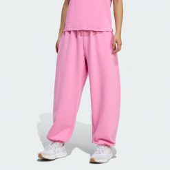 Spodnie Soft Lux Loose. Czerwone spodnie dresowe damskie Adidas, l, bez wzorów. Za 329.00 zł.