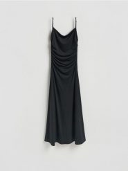 Sukienka z odkrytymi plecami - czarny. Czarne sukienki damskie Reserved, l, bez wzorów, z dzianiny, bez kołnierzyka, bez ramiączek, rozkloszowane. Za 129.99 zł.