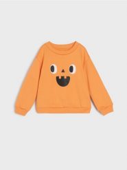 Bluza z motywem halloween - pomarańczowy. Brązowe bluzy i bluzki niemowlęce Sinsay, bez wzorów, bez ramiączek, bez kaptura. Za 9.99 zł.