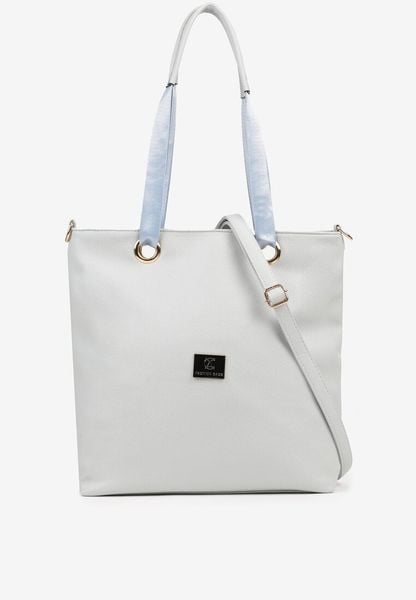 Niebieska Torebka Shopperka z Metalicznymi Wstawkami Lanastiela. Niebieskie torebki klasyczne damskie Born2be, bez wzorów, z jeansu, bez dodatków. Za 129.99 zł.