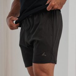 Premium Active Short - Spodnie sportowe. Czarne spodnie sportowe męskie REEVA, z tkaniny. Za 196.00 zł.