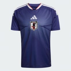 Koszulka domowa Japonia 26. Niebieskie t-shirty sportowe męskie Adidas, xl, z dzianiny, bez ramiączek, do piłki nożnej, climacool (adidas). Za 439.00 zł.