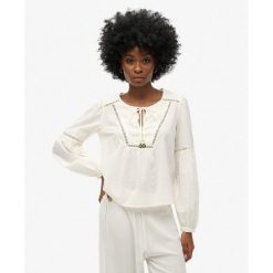 Bluzka plażowa z długim rękawem Ibiza. Białe bielizna termoaktywna damska Superdry., bez wzorów. Za 339.45 zł.