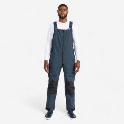 Spodnie żeglarskie męskie Decathlon Sailing 500 na szelkach. Czarne spodnie materiałowe męskie Decathlon, bez wzorów, z polaru, sportowe. Za 399.99 zł.