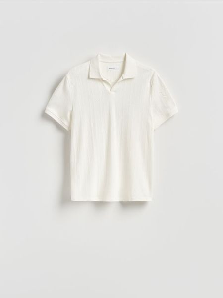 Bawełniana koszulka polo - złamana biel. Koszulki polo męskie Reserved, l, bez wzorów, z bawełny, bez ramiączek. Za 119.99 zł.
