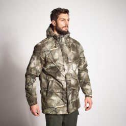 Kurtka myśliwska Solognac Warm 100 wodoodporna camo treemetic. Brązowe kurtki męskie SOLOGNAC, m, bez wzorów, z materiału, bez kaptura. Za 299.99 zł.