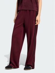 Adidas Spodnie dresowe Firebird Loose Tracksuit KS4669 Bordowy Loose Fit. Czerwone spodnie dresowe damskie Adidas, l, bez wzorów, z dresówki. Za 298.99 zł.