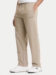 Guess Spodnie dresowe Z6GB01 K2834 Beżowy Regular Fit. Brązowe spodnie dresowe męskie Guess, z aplikacjami, z bawełny. Za 469.99 zł.