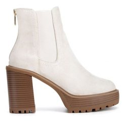 Botki Nine West. Botki damskie Nine West, bez obcasa, na słupku, bez zapięcia. Za 299.99 zł.