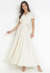 Jasnobeżowa Elegancka Sukienka Maxi w Plisy z Kopertowym Dekoltem i Wiązaniem Thessi. Brązowe sukienki damskie Born2be, na lato, m, bez wzorów, eleganckie, bez kołnierzyka, bez ramiączek, maxi, kopertowe. W wyprzedaży za 67.99 zł.