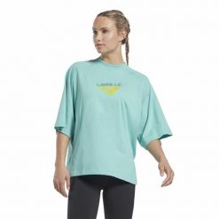 Koszulka z krótkim rękawem Damska Reebok Les Mills®. Bluzki sportowe damskie Reebok, xs, bez wzorów, bez ramiączek. Za 123.00 zł.