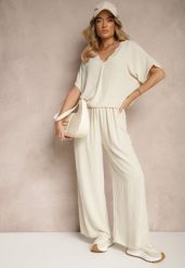 Ciemnobeżowy Bawełniany Komplet Spodnie o Szerokim Kroju i T-shirt Oversize Seltebis. Brązowe spodnie materiałowe damskie Renee, z aplikacjami, z bawełny, eleganckie. Za 59.99 zł.