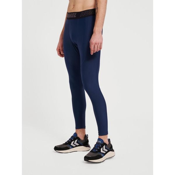 Legginsy Hummel TE Topaz. Niebieskie spodnie sportowe męskie HUMMEL, z dżerseju. Za 158.50 zł.