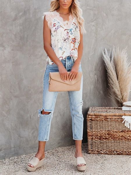 Milan Kiss Bluzka w kolorze kremowym ze wzorem rozmiar: XL. Brązowe bluzki damskie Milan Kiss, xl, bez wzorów, z koronki, bez kołnierzyka, bez ramiączek. Za 122.09 zł.