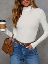 Milan Kiss Koszulka w kolorze kremowym rozmiar: M. Brązowe bluzki damskie Milan Kiss, m, bez wzorów, bez kołnierzyka. Za 130.99 zł.