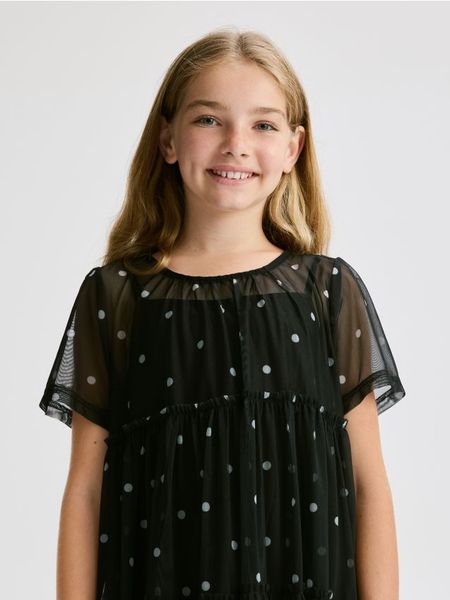 Tiulowa sukienka - czarny. Czarne sukienki dziewczęce Reserved, bez wzorów, z tiulu, bez ramiączek. W wyprzedaży za 49.99 zł.