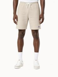 Szorty Le Coq Sportif Essential. Zielone szorty męskie Le Coq Sportif, z materiału, bez kołnierzyka. Za 296.00 zł.