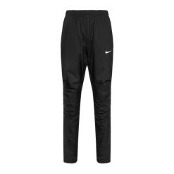 Spodnie do biegania damskie Nike Woven. Czarne spodnie materiałowe damskie Nike, bez wzorów, sportowe. Za 149.99 zł.