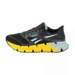 Reebok Floatzig 2 czarne buty do biegania męskie. Żółte obuwie do biegania damskie Reebok. Za 521.75 zł.