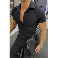 Męska koszula ARON BLACK. Czarne koszule męskie Męska koszula ARON BLACK, l, bez wzorów, bez kołnierzyka, bez ramiączek. W wyprzedaży za 69.00 zł.