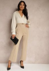Beżowy Kopertowy Kombinezon z Elegancką Koszulową Górą i Szerokimi Nogawkami Vareti. Brązowe kombinezony damskie Renee, l, bez wzorów, biznesowe, bez kołnierzyka, bez ramiączek. Za 119.99 zł.