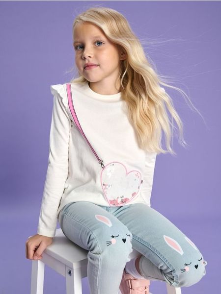 Koszulka z długimi rękawami - biały. Białe koszulki dziewczęce Sinsay, l, bez wzorów, bez ramiączek. Za 17.99 zł.