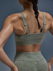 4F Biustonosz do jogi i pilatesu ze średnim wsparciem damski - zielony M/L. Zielone biustonosze sportowe damskie 4f, bez wzorów, z gumy. Za 119.99 zł.