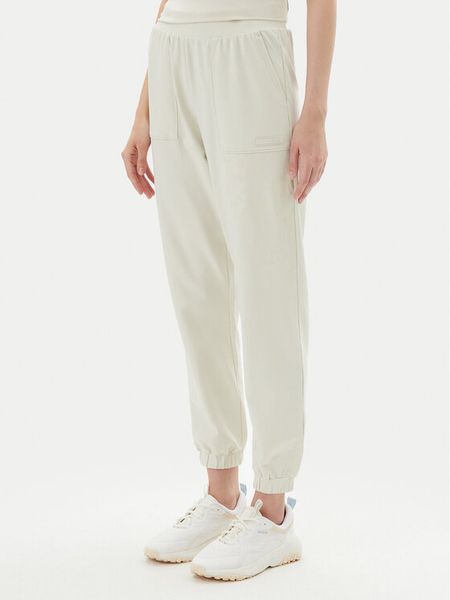 EA7 Emporio Armani Spodnie dresowe 7W000480 AF13135 U1112 Beżowy Regular Fit. Brązowe spodnie dresowe damskie EA7 Emporio Armani, l, bez wzorów, z bawełny. Za 249.99 zł.