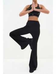 Onamaste Legginsy sportowe "Flair" w kolorze czarnym rozmiar: L/XL. Czarne legginsy damskie Onamaste, l, bez wzorów, z materiału. Za 175.67 zł.