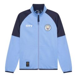 Dres piłkarski dla dorosłych Manchester City 24/25. Niebieskie spodnie dresowe damskie MANCHESTER CITY, m, bez wzorów, z dresówki. W wyprzedaży za 214.99 zł.