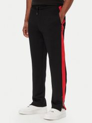 HUGO Spodnie dresowe Dolos 50551351 Czarny Relaxed Fit. Czarne spodnie dresowe męskie Hugo, bez wzorów, z dresówki. Za 599.99 zł.