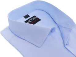 Błękitna/niebieska gładka koszula męska Y72. Niebieskie koszule męskie Modini Moda Męska, m, bez wzorów, z bawełny, bez kołnierzyka, bez ramiączek. W wyprzedaży za 169.20 zł.