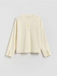 Koszulka z haftem - kremowy. Białe koszulki dziewczęce Reserved, bez wzorów, z bawełny, bez ramiączek. Za 45.99 zł.