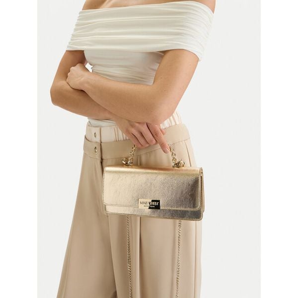 Torebka Nine West. Żółte torebki klasyczne damskie Nine West, bez wzorów, bez dodatków. Za 179.99 zł.