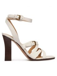 Guess Sandały FLJRAD LEA03 Kremowy. Białe sandały damskie Guess, z aplikacjami, ze skóry, bez obcasa, na słupku. Za 719.99 zł.