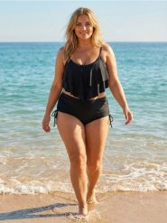 Góra od bikini typu beach top z falbaną - czarny. Czarne bikini damskie Sinsay, bez wzorów. Za 29.99 zł.