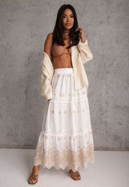 Biało-Beżowa Bawełniana Spódnica Casual w Stylu Boho Ozdobiona Wycięciami i Haftowanymi Wzorami Hermat. Brązowe spódniczki damskie Renee, l, z aplikacjami, z bawełny, boho, z podwyższonym stanem, maxi, dopasowane. Za 129.99 zł.