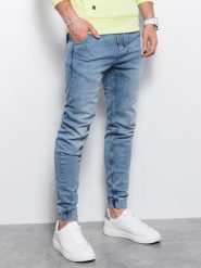 Spodnie męskie jeansowe joggery - jasnoniebieskie - Rozmiar: M. Niebieskie spodnie materiałowe męskie Ombre Clothing, bez wzorów, z bawełny. W wyprzedaży za 49.99 zł.