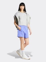 Adidas Szorty w kolorze błękitnym rozmiar: 116. Niebieskie szorty damskie Adidas, bez wzorów, z bawełny. Za 153.71 zł.