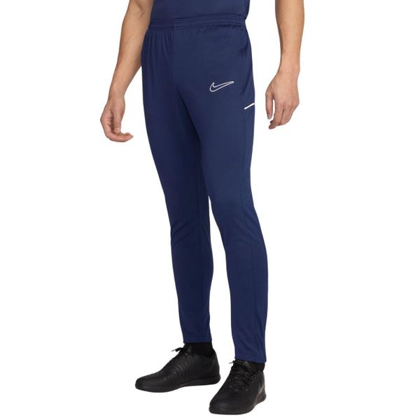 Spodnie męskie Nike Dri-Fit Academy 25. Niebieskie spodnie materiałowe męskie Nike, bez wzorów, z poliesteru, sportowe. Za 141.99 zł.