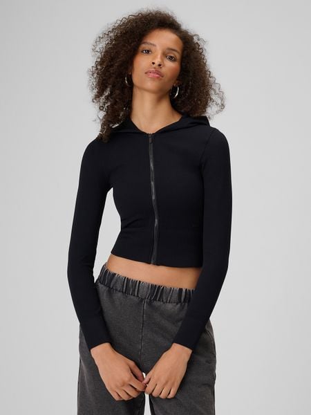 4F Bluza bezszwowa slim z kapturem damska - czarna XS/S. Czarne bluzy z kapturem damskie 4f, l, bez wzorów. Za 169.99 zł.